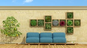 Vanguardia verde con un jardín vertical o plantas colgantes